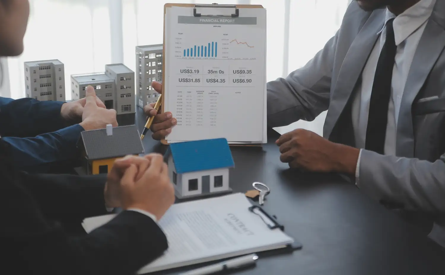 Real estate meeting with report.